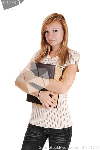 Image of Girl holding big book.