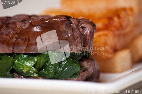 Image of Steak medallions and fries