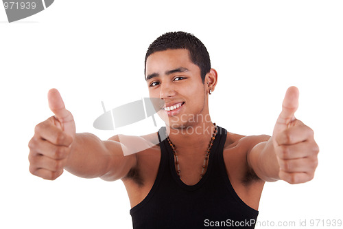 Image of Young latin man with thumbs raised as a sign of ok