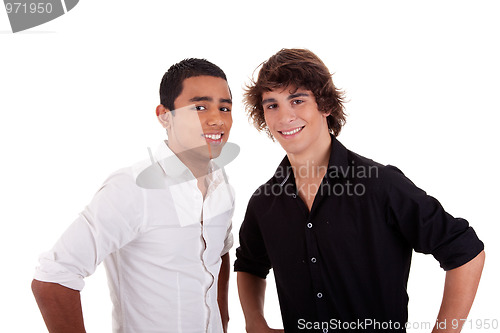 Image of friends: two young man of different colors,looking to camera and smiling