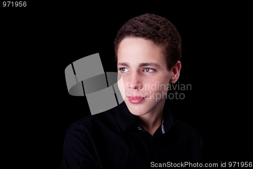 Image of cute boy, smiling on black