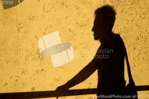 Image of Man Shadow with Bag