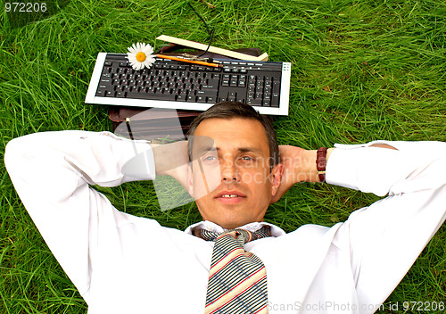 Image of relax positive businessman