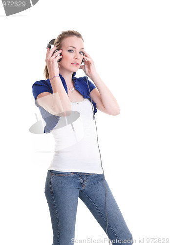 Image of young woman listening headphones