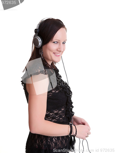 Image of young woman listening headphones