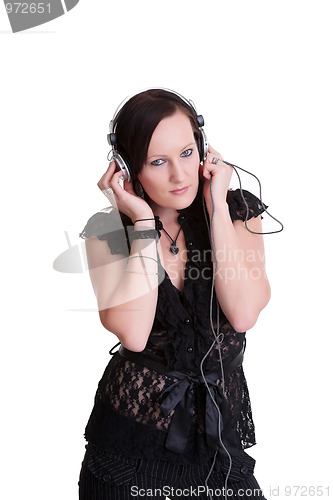 Image of young woman listening headphones