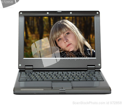 Image of laptop with beauty girl portrait