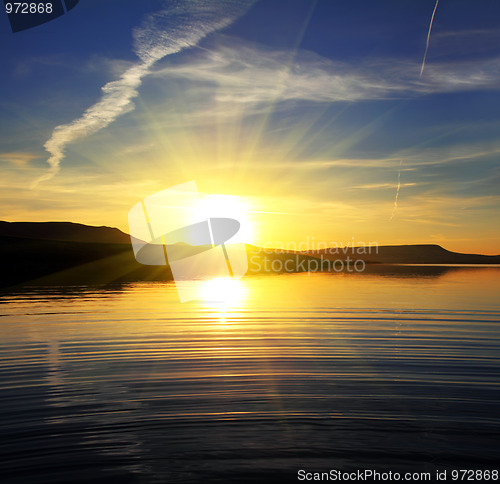Image of morning lake landscape with sunrise