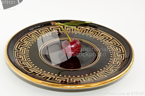Image of Cherry on a saucer