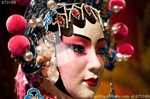 Image of chinese opera dummy and red cloth as text space ,it is a toy,not