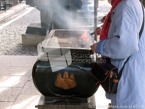 Image of Burning incenses