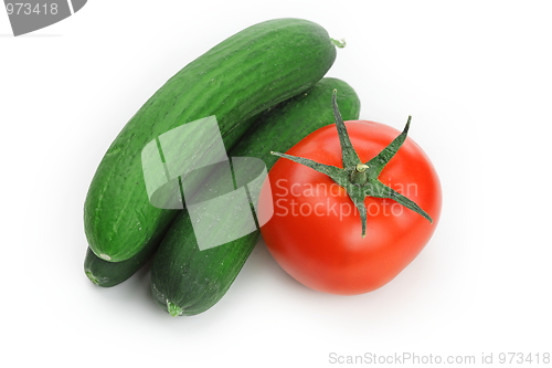 Image of Tasty kitchen. Fresh vegetables isolated on white
