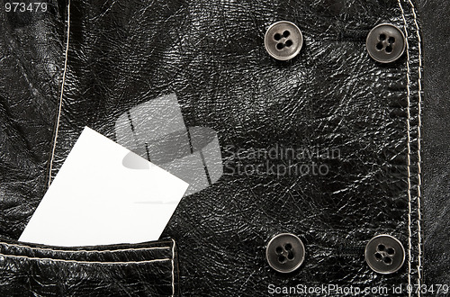 Image of Blank card in a pocket of leather jacket