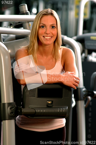 Image of pretty woman in fitness center