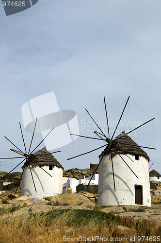 Image of windmill Ios Island Cyclades Greece with thatch roof and white s