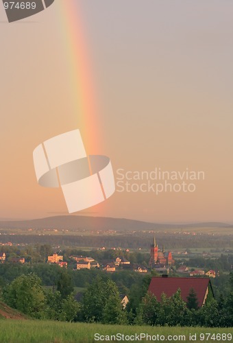 Image of Rainbow over village