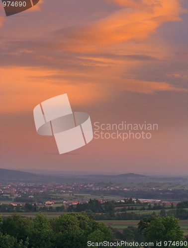 Image of Sunset over village
