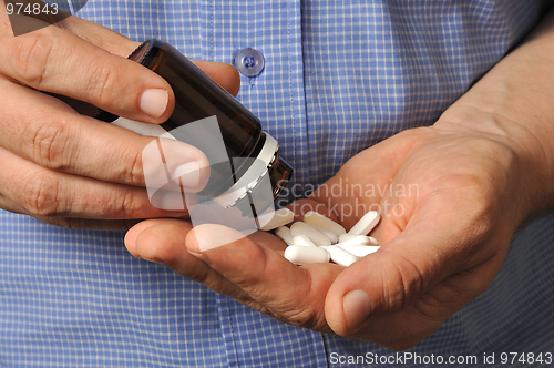 Image of Man with Pills