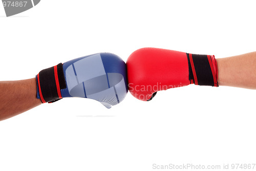 Image of Two boxers touch gloves ready to start fight