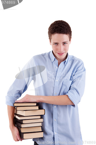 Image of young and beautiful boy, with books on the hands