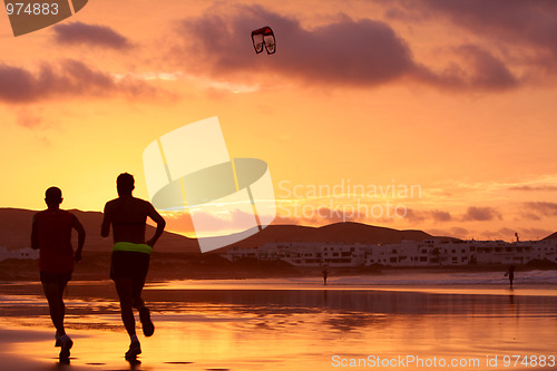 Image of orange sunset in playa Famara, Lanzarote 