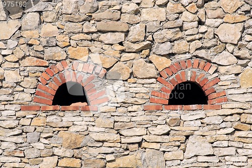 Image of Lime wall with small windows