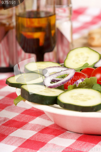 Image of Mixed salad on a set table