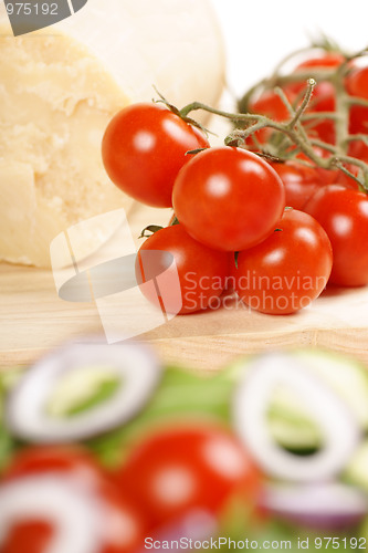 Image of Cherry tomatoes and parmesan cheese