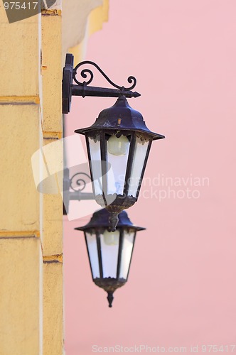 Image of Two lamps on a wall