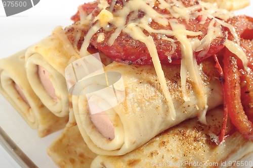 Image of Pancakes with sausages and tomatoes