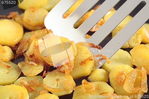 Image of Fried potatoes' slices