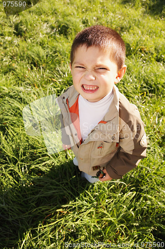Image of Little squinting boy