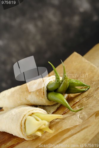 Image of Pancakes wrapped bean's pods