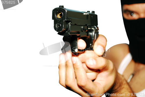 Image of man holding up a gun