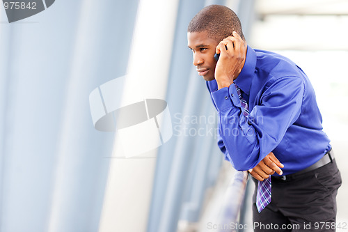 Image of Black businessman on the phone