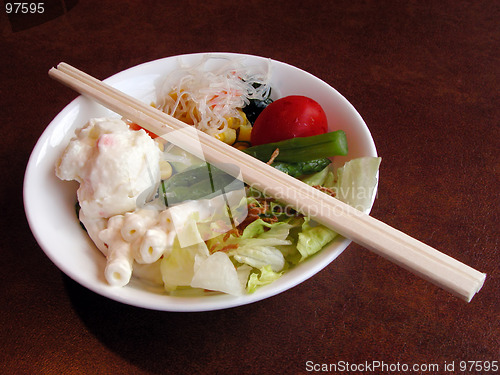 Image of Salad and chopsticks