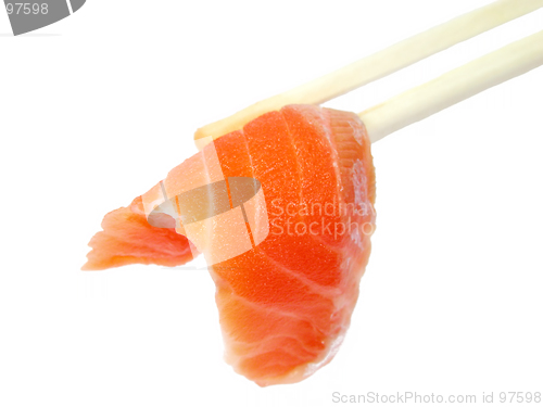 Image of Salmon meat in chopsticks