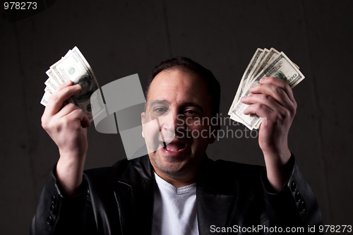 Image of Man Holding Out Money