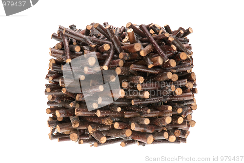 Image of Pile of assorted sawed twigs and branches 