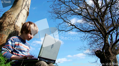 Image of Attention.(child with notebook sit blue sky )