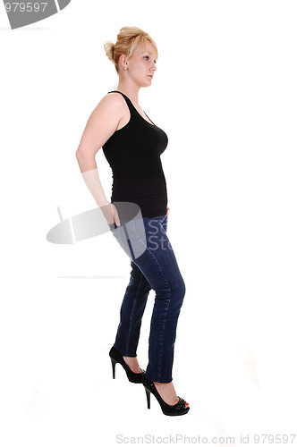 Image of Blond girl in jeans.