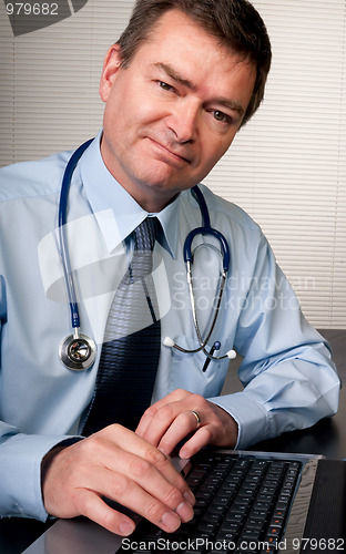 Image of Welcoming doctor listens to patient