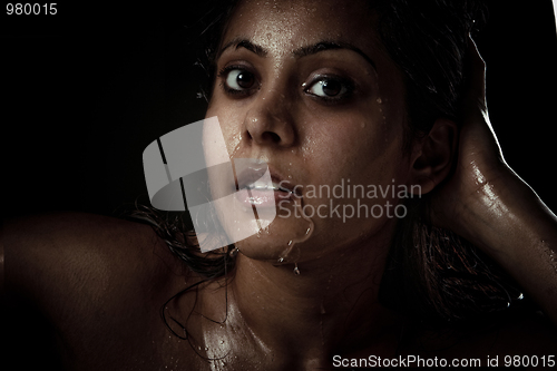 Image of Portrait of beautiful young woman with wet face