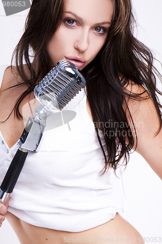 Image of Sexy Girl singing in retro mic