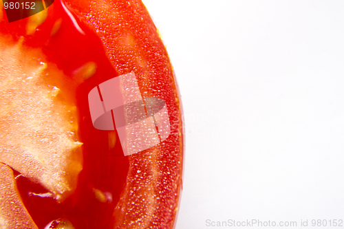 Image of close-up of fresh red tomato on the white background