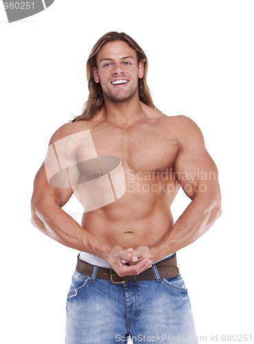 Image of Athletic sexy male body builder with the blonde long hair. gladi