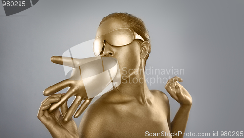 Image of gold bodypainted girl 