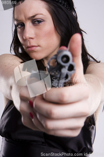 Image of Gun At Womans Head