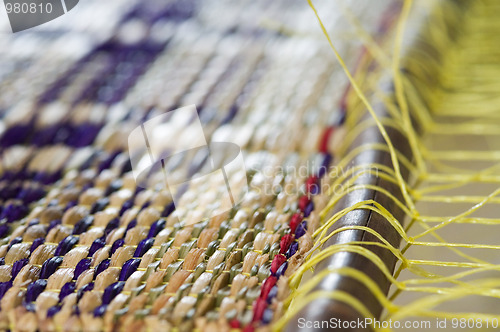 Image of Detail of straw mat on a weave
