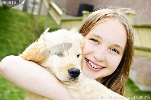 Image of Girl with puppy